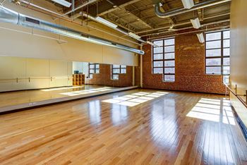 Dance and movement studio with cushioned hardwood flooring
